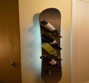 Handmade wine cellar made of Snowboard